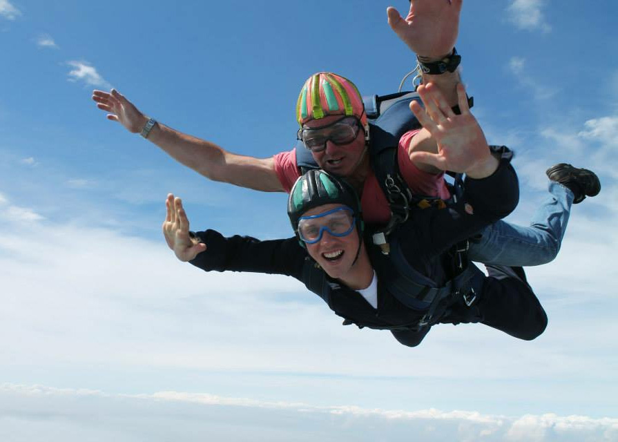 Stephen Forster is pictured attached to his instructor during the Tandem Skydive.