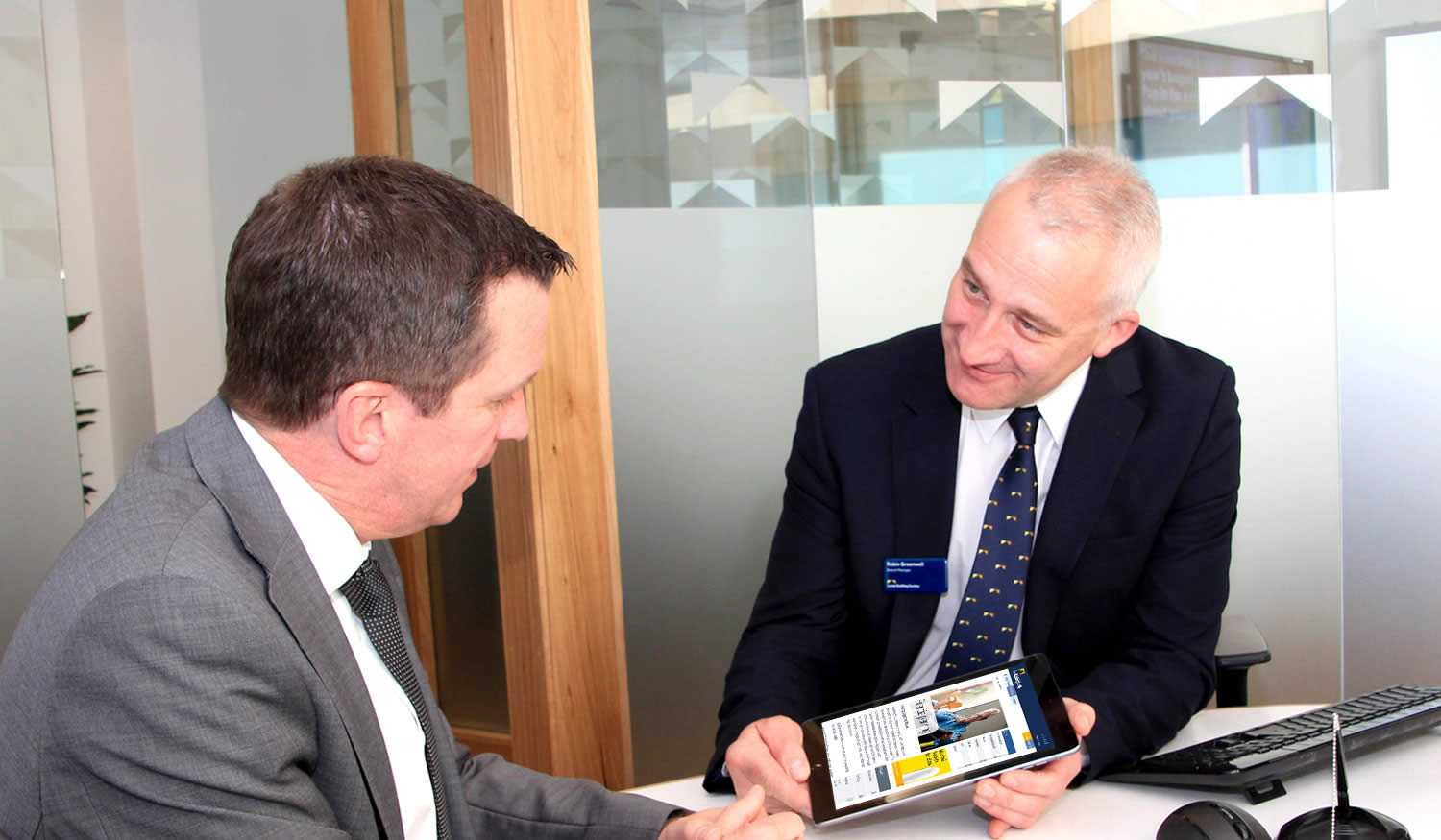advisor talking to customer about paperwork