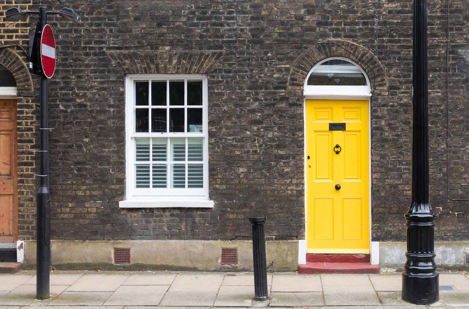 house with a yellow door
