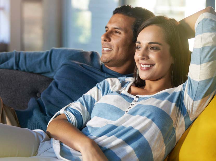 Two people on a sofa