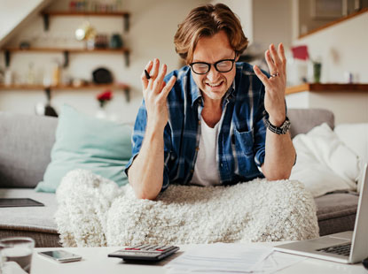 man frustrated with his finances