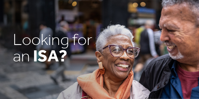 Two people smiling and the words 'Looking for an ISA?'