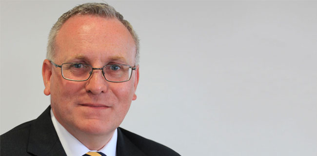 A photograph of Tom Clark