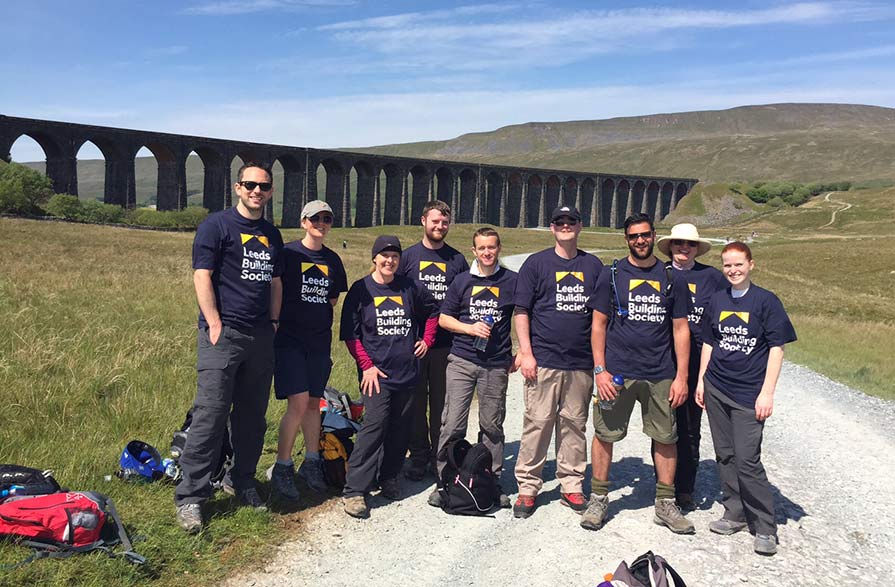 Pictured in front of the viaduct by Whernside (From L-R) are: Graeme McRitchie, Joanna Kneafsey , Karen Bassett , Daniel McGrath , David Bews , Tony Roberts , Nick Green , Sarah Frost and Becky Simmons .