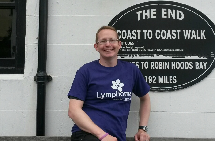 Simon Halladay is pictured at the culmination of the Coast to Coast walk in Robin Hood’s Bay.