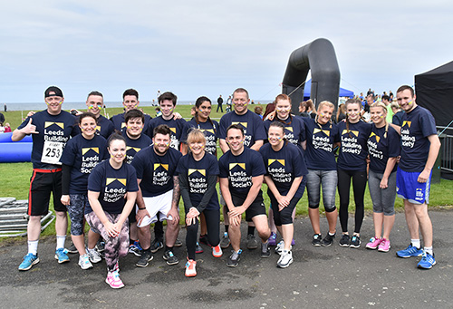 The team taking part in the Beach Warrior assault course