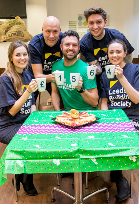 The team's full coffee morning total