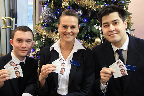 Head Office Branch members with charity vouchers