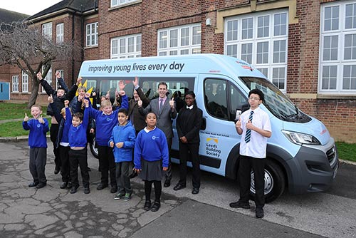 Children of Rush Hall with their new Sunshine Coach
