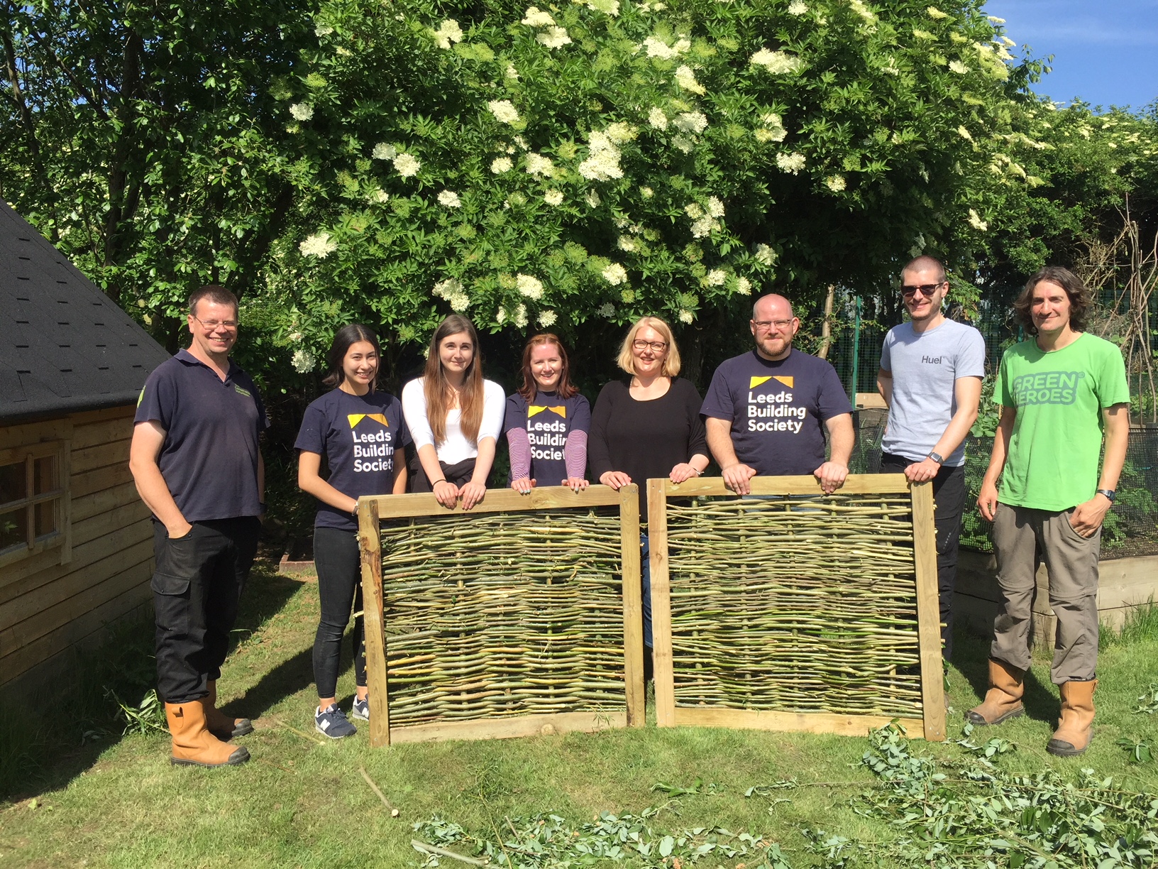 Leeds Building Society volunteers with their willow fences