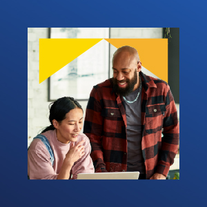 two people looking at laptop